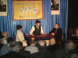 Richard performs at Fechter's Finger Flicking Frolic, assisted by Trixie Bond and Boris Wild.